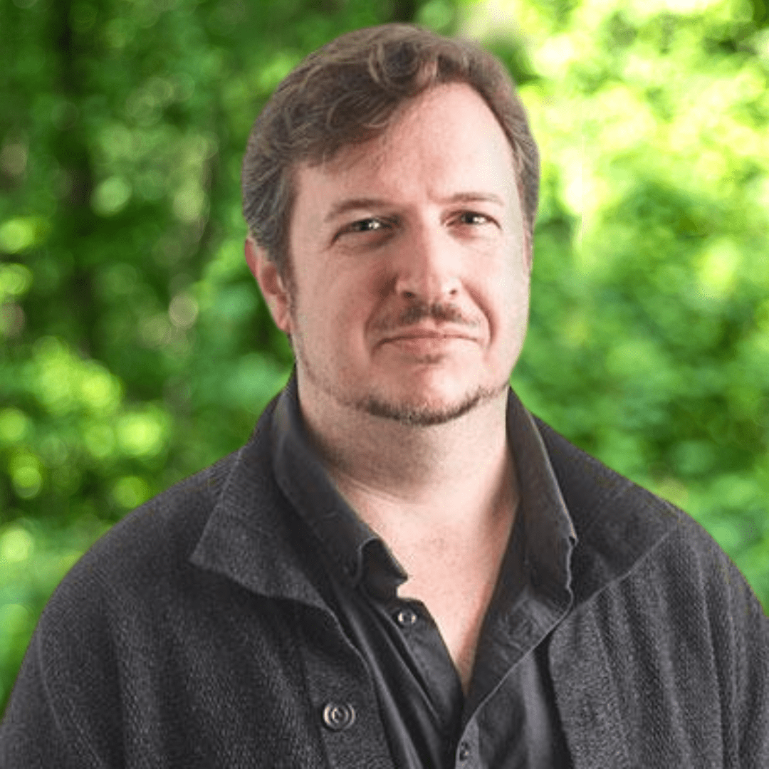 Chad Buterbaugh headshot. Man with dark collared shirt