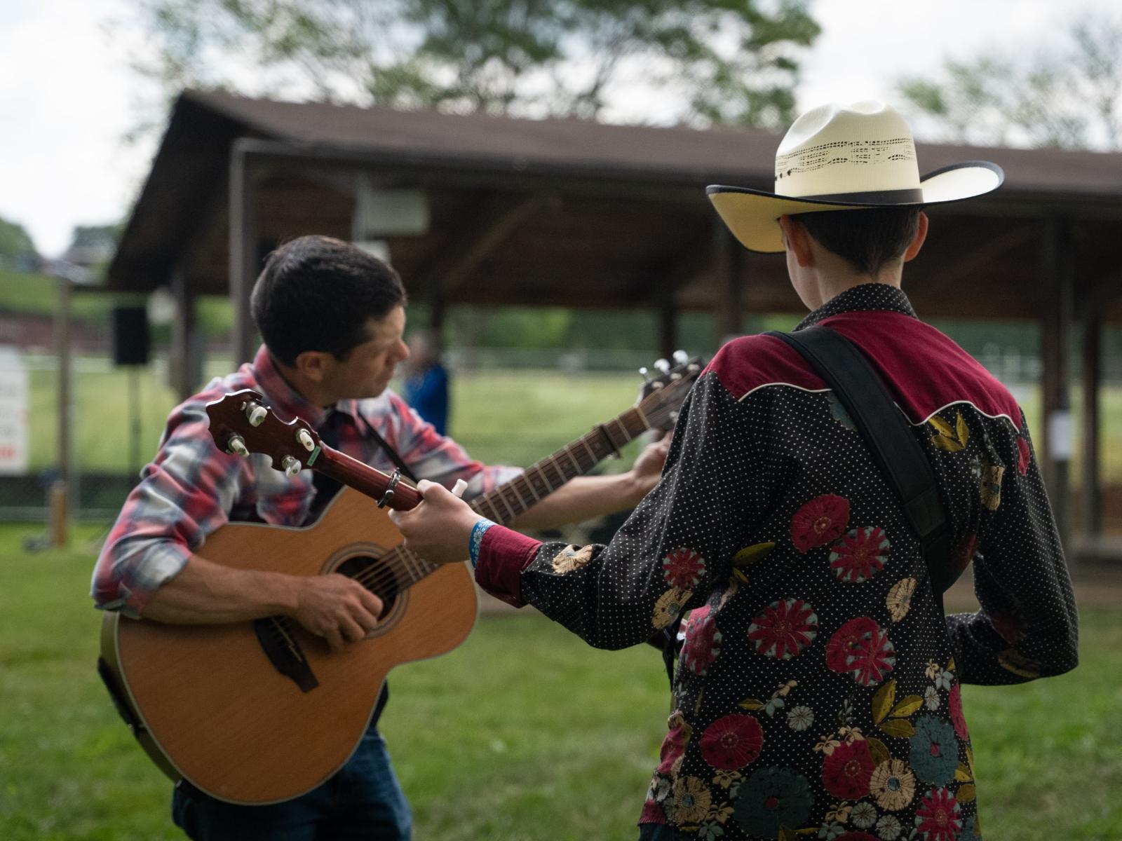 Musicians playing together at Common Ground on the Hill Roots Music & Arts Festival (Carroll).